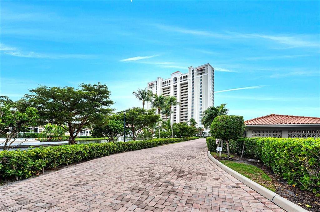 6573 Marissa Loop, Unit 1704 Naples, FL 34108 - Photo 29 of 39 a view of a city with tall buildings in the background
