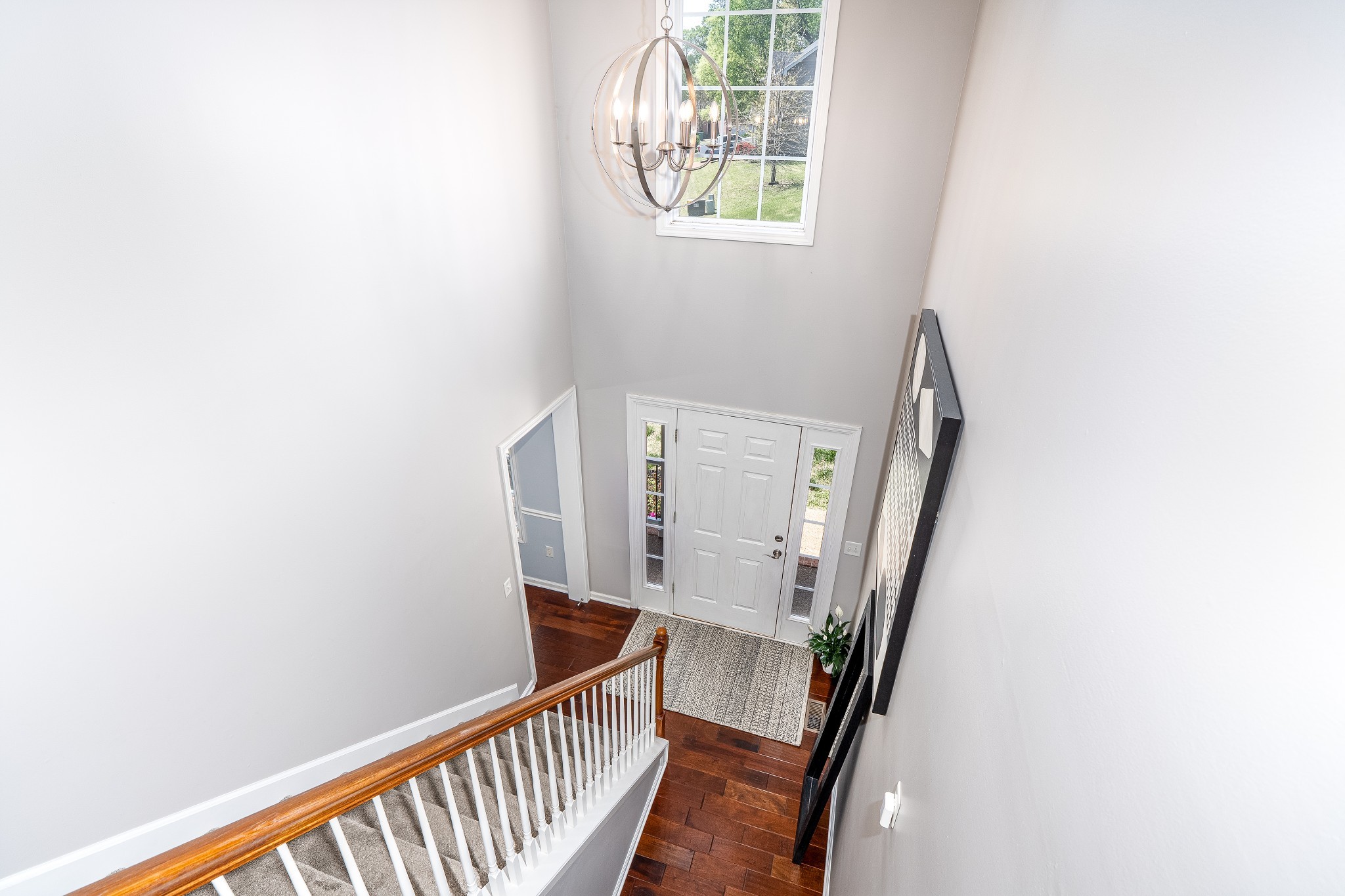 2102 Burgess Lane Spring Hill, TN 37174 - Photo 17 of 45 a view of staircase with railing and white walls