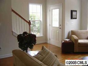 4136 Walker Road, Unit 4136 Charlotte, NC 28211 - Photo 2 of 8 a living room with furniture and a large window