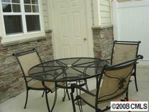 4136 Walker Road, Unit 4136 Charlotte, NC 28211 - Photo 5 of 8 a couple of chairs sitting in front of a door