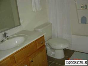 4136 Walker Road, Unit 4136 Charlotte, NC 28211 - Photo 7 of 8 a bathroom with a sink and a toilet