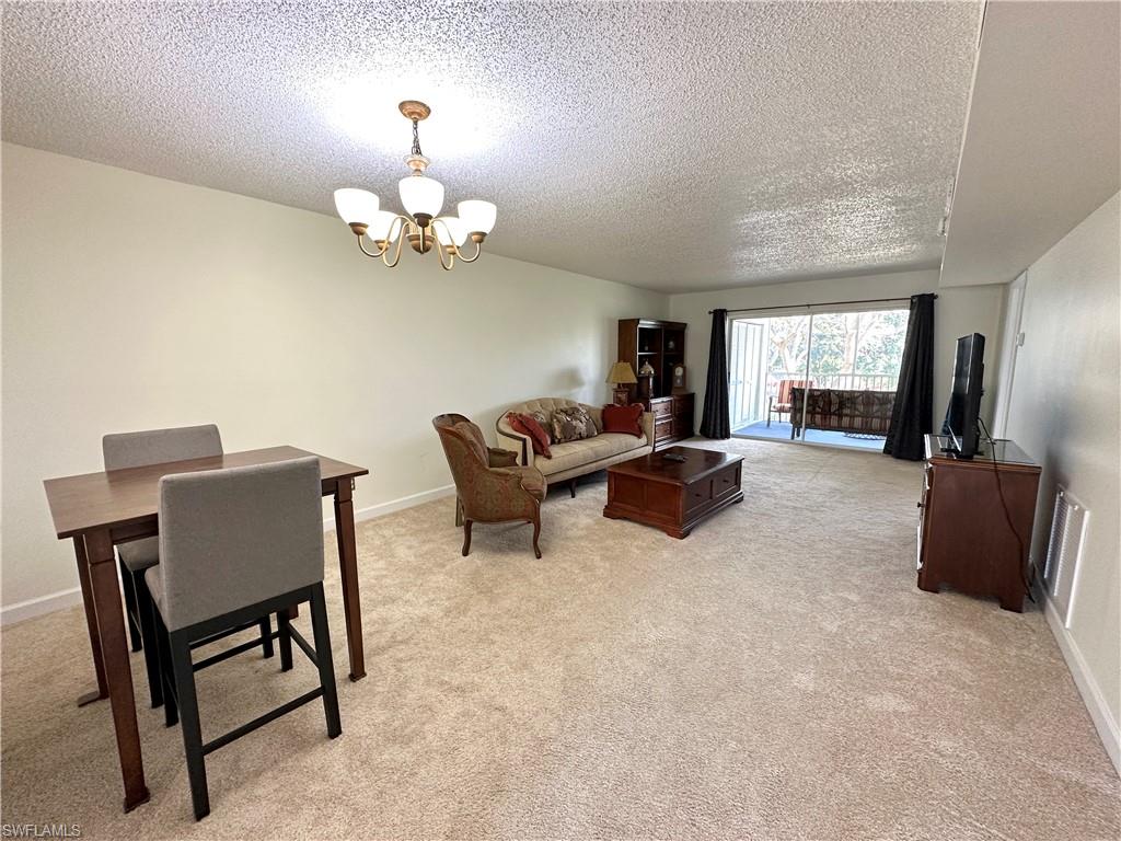 5651 Rattlesnake Hammock Road, Unit 202C Naples, FL 34113 - Photo 3 of 9 Gallery Image 3