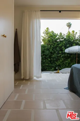 a bathroom with sinks and a bathtub