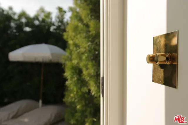 a view of swimming pool with a lounge chair