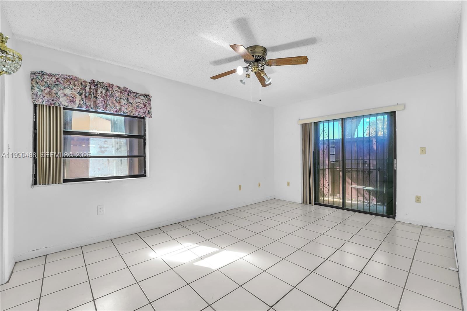 6671 Southwest 137th Court, Unit 7A Miami, FL 33183 - Photo 11 of 13 a view of an empty room