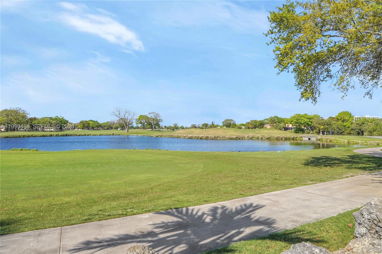 6671 Southwest 137th Court, Unit 7A Miami, FL 33183 - Photo 13 of 13 a view of a lake with a city
