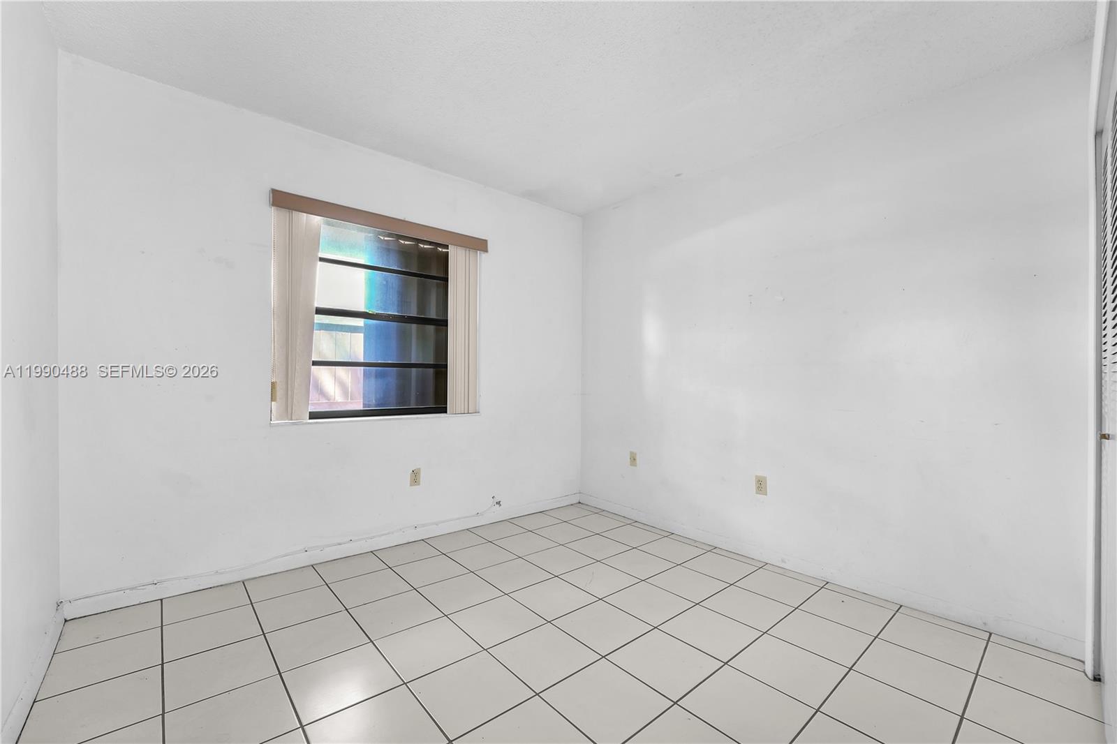6671 Southwest 137th Court, Unit 7A Miami, FL 33183 - Photo 10 of 13 a view of an empty room