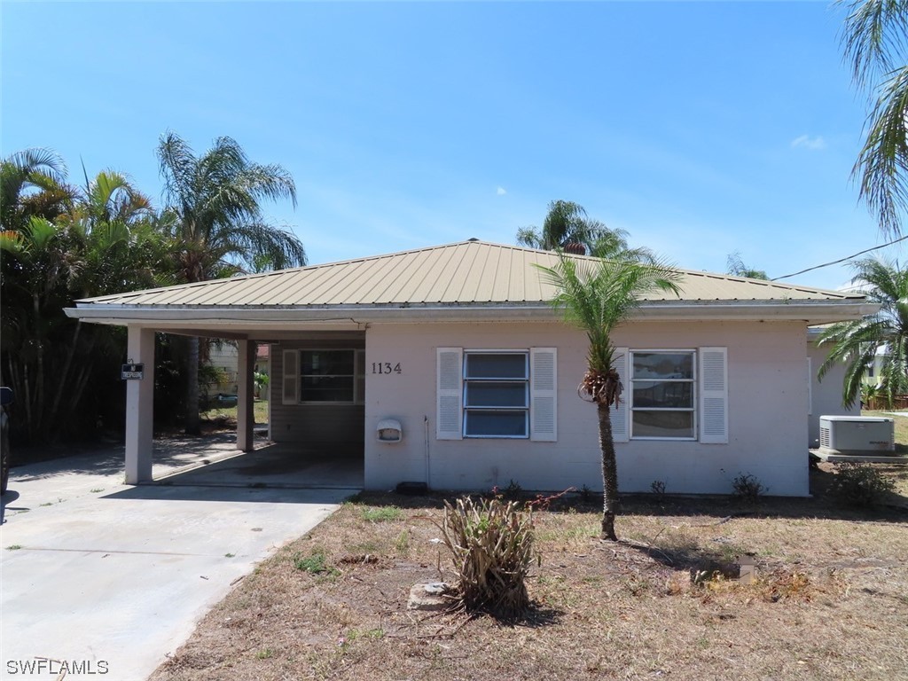 1134 6th Street Okeechobee, FL 34974 - Photo 1 of 15 a front view of a house