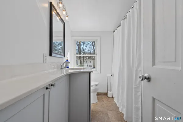 a kitchen with a sink and a window
