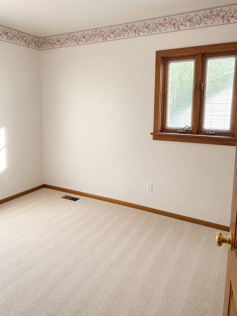 1707 Wright Street Streator, IL 61364 - Photo 9 of 9 a view of an empty room with a window