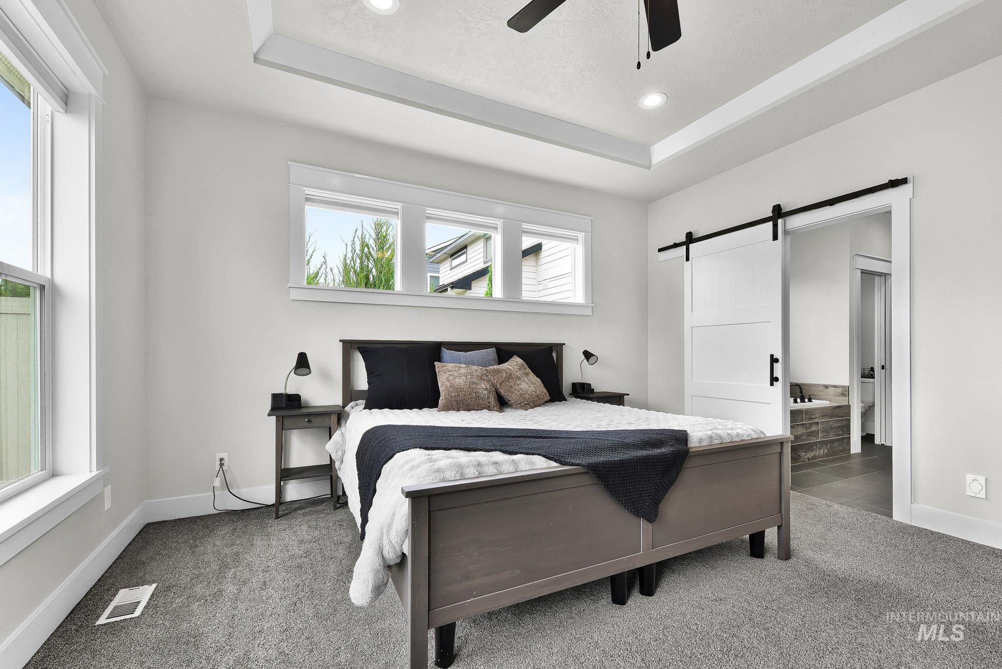5676 East Zaffre Ridge Street Boise, ID 83716 - Photo 23 of 50 Tray ceiling featuring recessed lighting and a ceiling fan