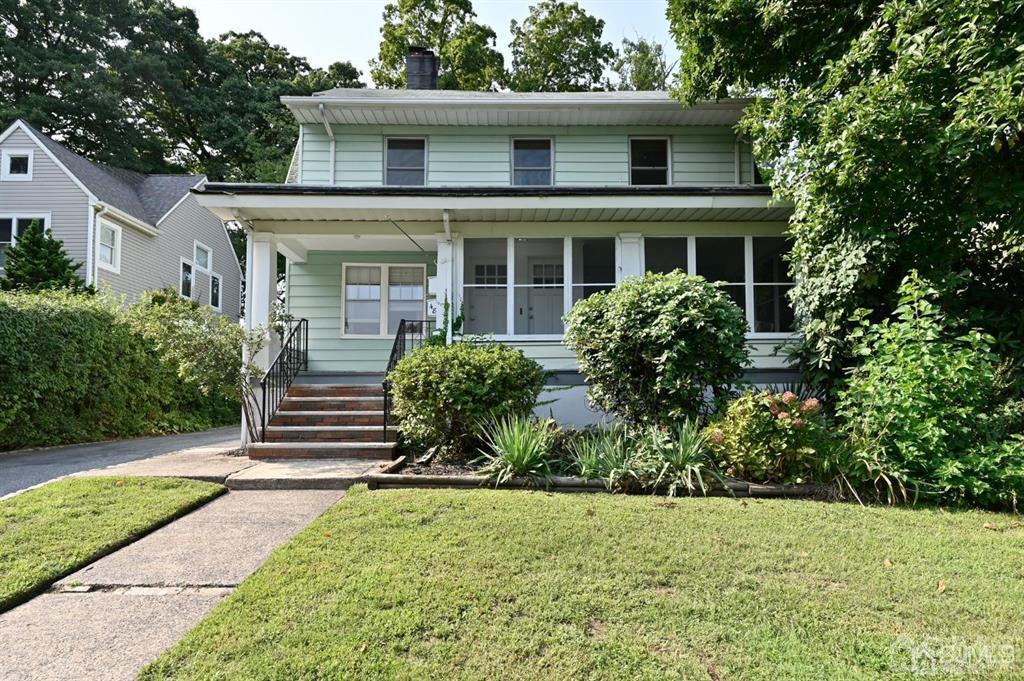 48 Christopher Street Montclair, NJ 07042 - Photo 1 of 23 front view of a house with a yard