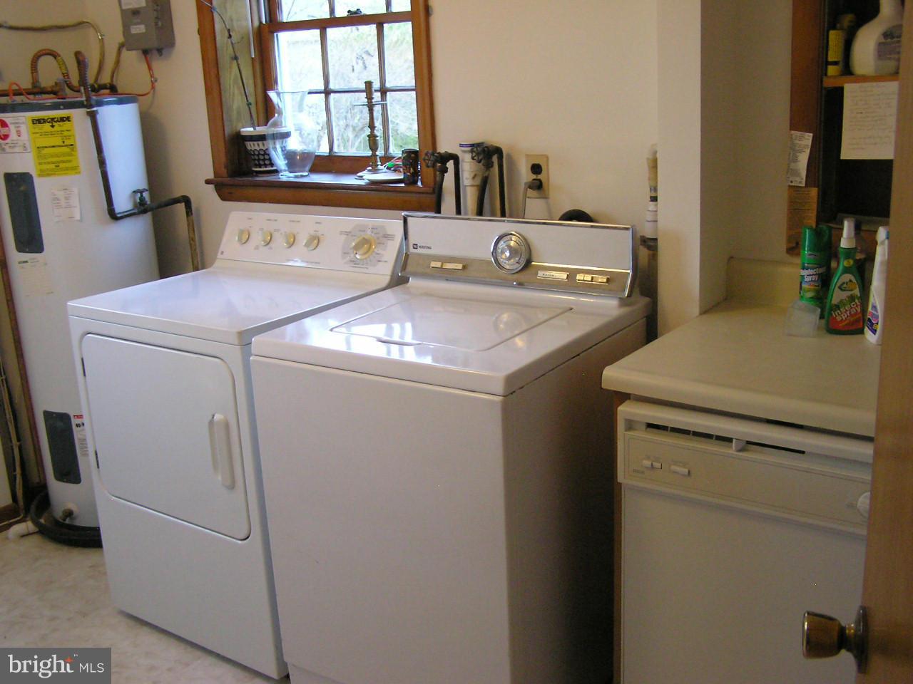 1532 Denton Road Baltimore, MD 21221 - Photo 19 of 22 a utility room with dryer and washer
