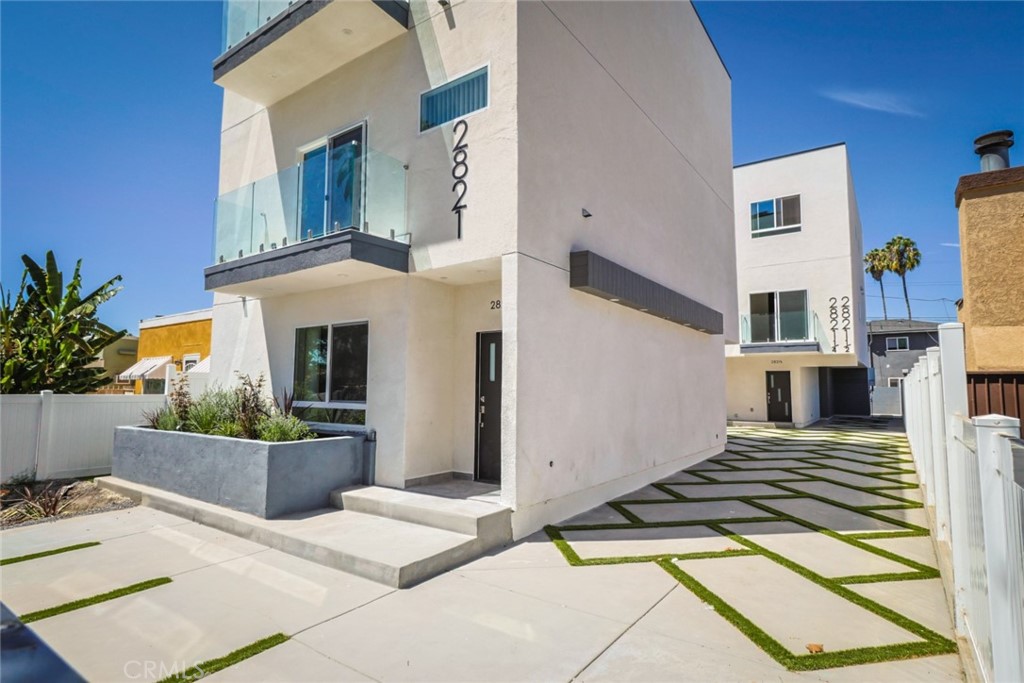 2821 Virginia Road Los Angeles, CA 90016 - Photo 1 of 1 a view of a house with barbeque oven and potted plants