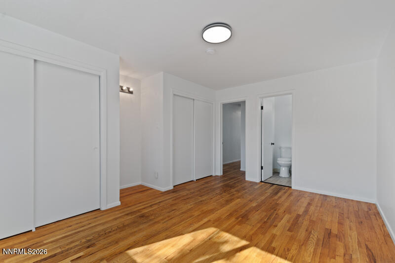 810 Lahontan Way Reno, NV 89509 - Photo 12 of 25 a view of a room with wooden floor and bathroom
