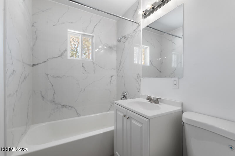 810 Lahontan Way Reno, NV 89509 - Photo 16 of 25 a bathroom with a sink a toilet and shower