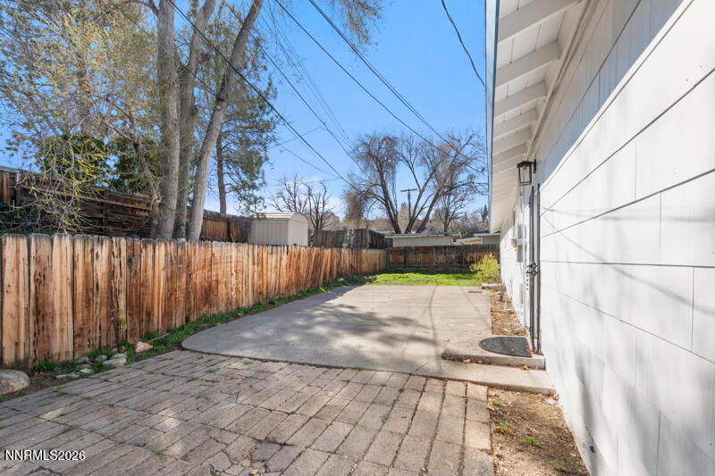 810 Lahontan Way Reno, NV 89509 - Photo 24 of 25 a view of backyard with wooden fence