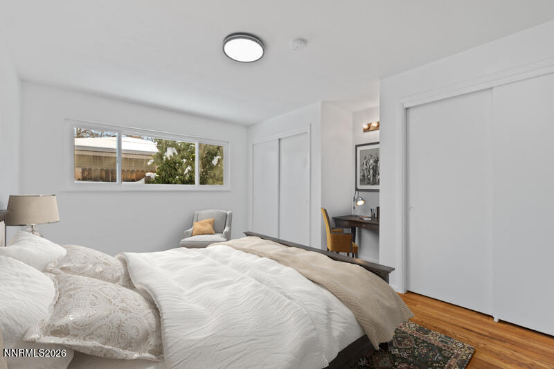 810 Lahontan Way Reno, NV 89509 - Photo 9 of 25 a bedroom with a large bed and a window