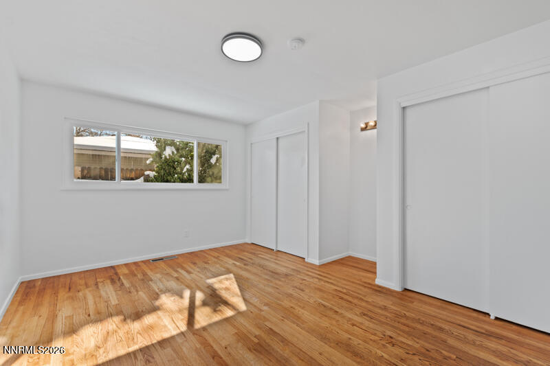 810 Lahontan Way Reno, NV 89509 - Photo 10 of 25 a bedroom with a bed and a window