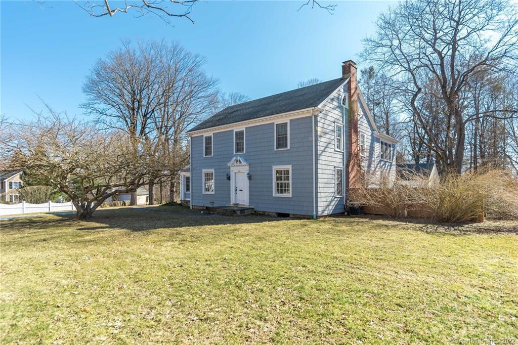 380 Wilton Road West Ridgefield, CT 06877 - Photo 1 of 1 a view of a house with a yard