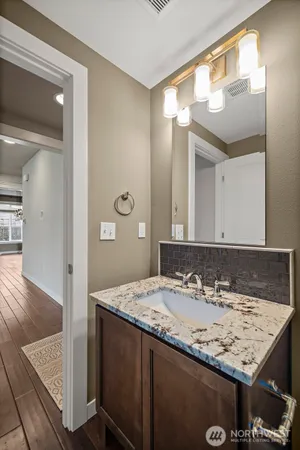 a balcony with furniture and a garden