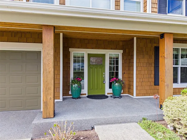 a view of a house with small garden