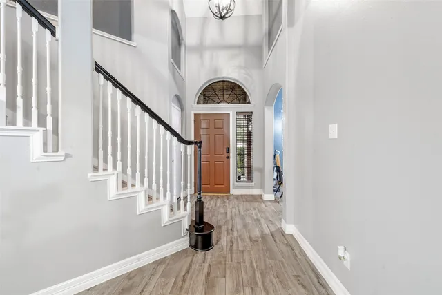 a view of entryway with wooden floor