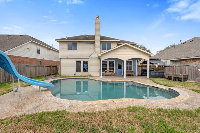 a view of a house with pool