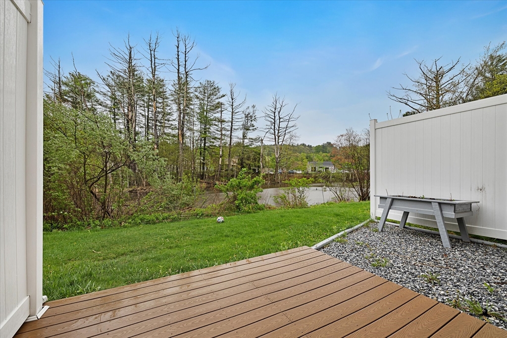 28 Southbridge Road, Unit 302 Charlton, MA 01507 - Photo 23 of 27 a view of a backyard with sitting area