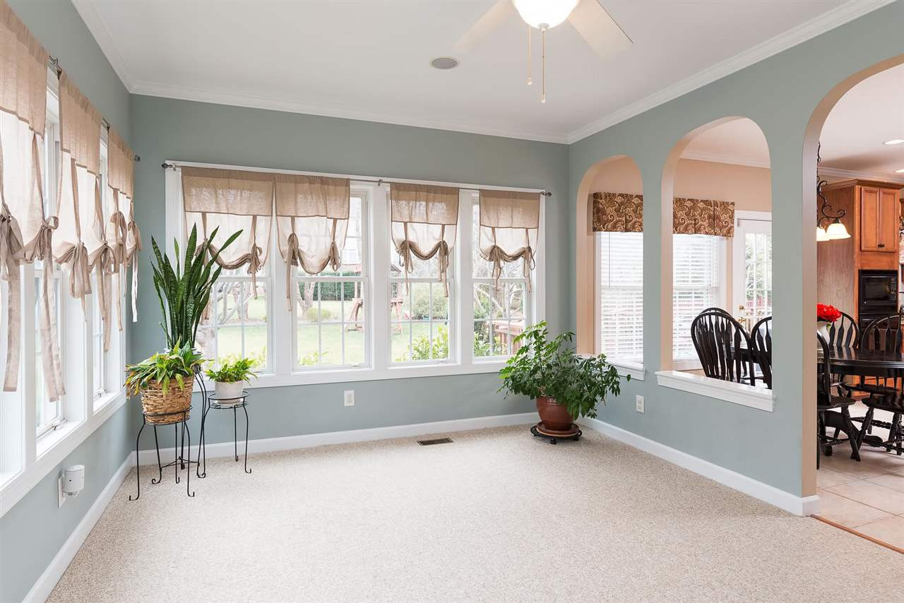 12301 Fieldmist Drive Raleigh, NC 27614 - Photo 12 of 25 This sunroom space can be used for so many things. Second office? Yoga and meditation room? Home school classroom? Music room? Art room? Reading room? Craft room? So many possibilities. Sunrom