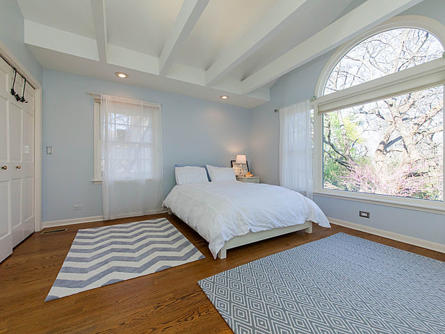 901 South County Line Road Hinsdale, IL 60521 - Photo 18 of 25 a bedroom with double bed and a window