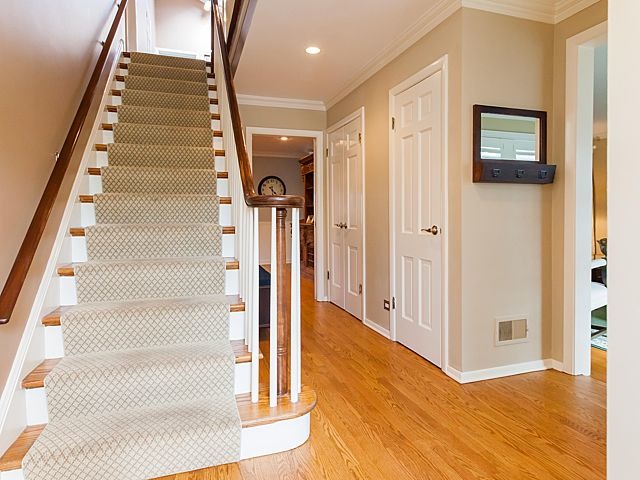 901 South County Line Road Hinsdale, IL 60521 - Photo 2 of 25 a view of an entryway with wooden floor and door