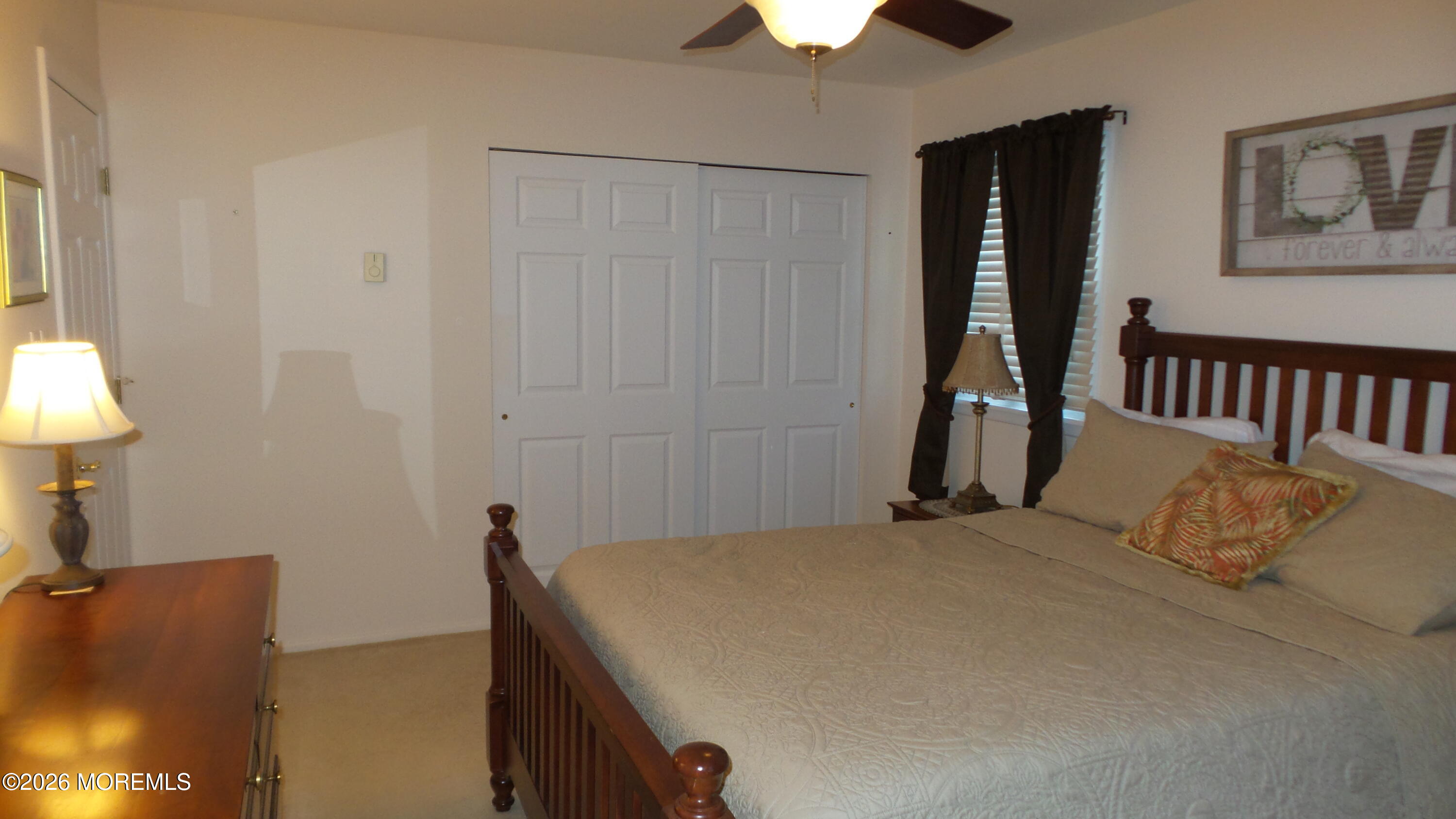 12 Barker Street Brick, NJ 08724 - Photo 11 of 17 a bedroom with a bed and a lamp