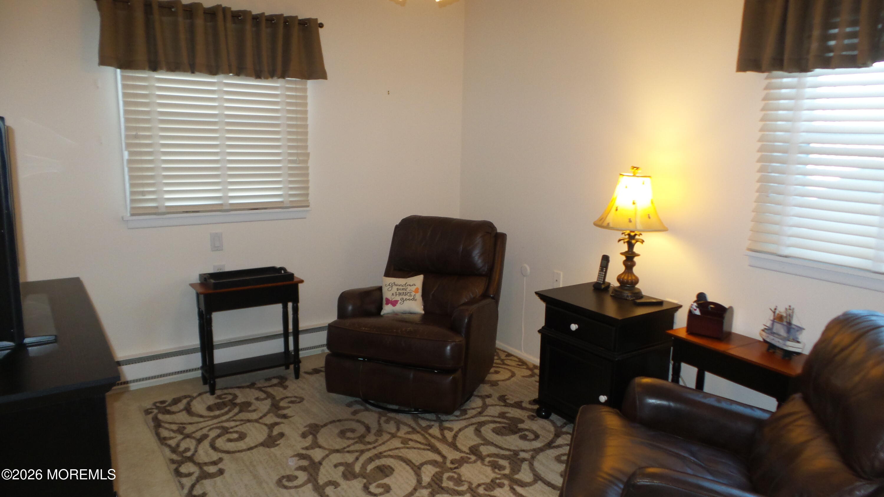 12 Barker Street Brick, NJ 08724 - Photo 12 of 17 a living room with furniture and a window
