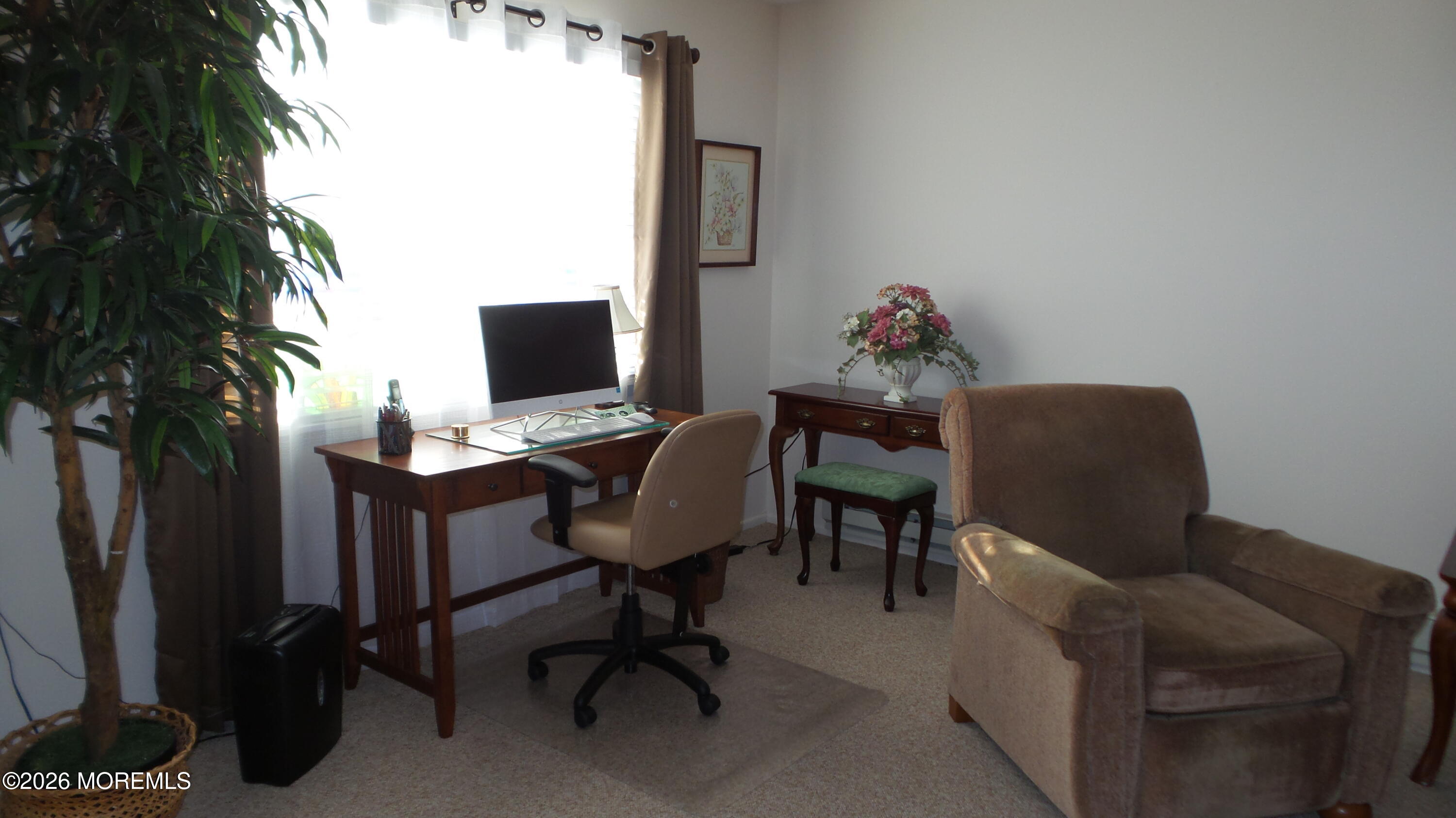 12 Barker Street Brick, NJ 08724 - Photo 6 of 17 a workspace with furniture and a potted plant