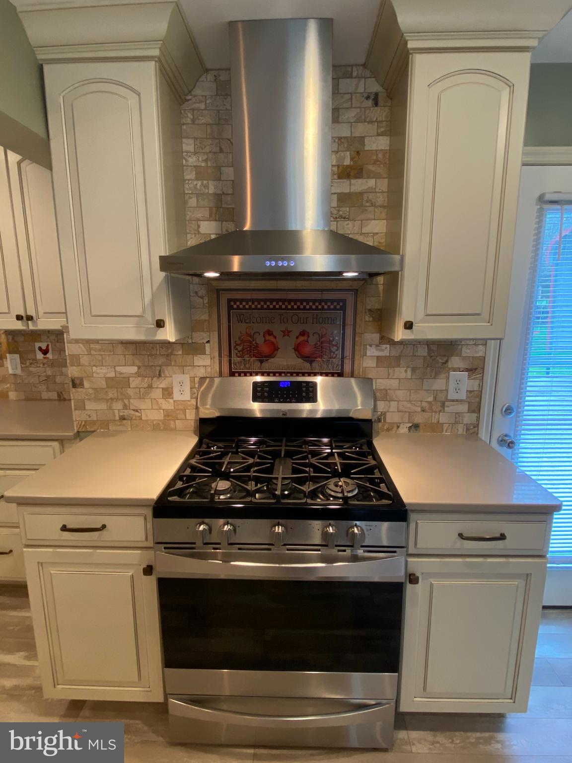 951 Hoffer Road Annville, PA 17003 - Photo 12 of 40 Gas range with stainless vent hood.