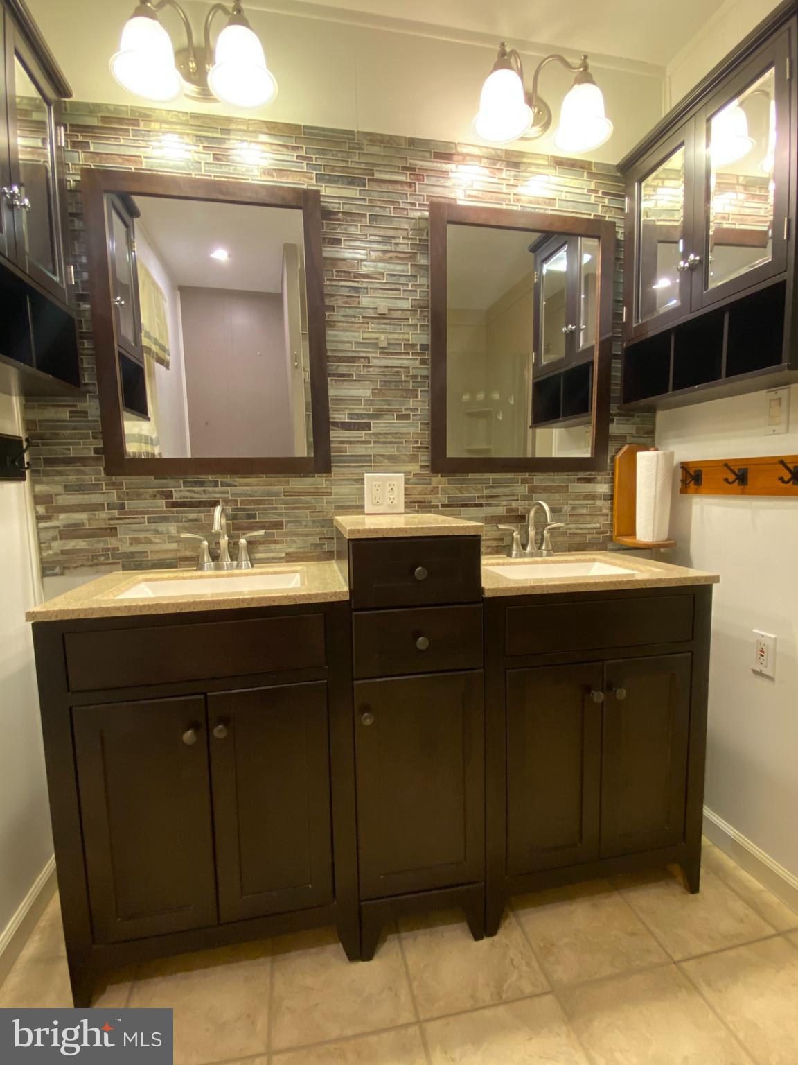 951 Hoffer Road Annville, PA 17003 - Photo 22 of 40 1st floor bathroom boasts a double vanity.
