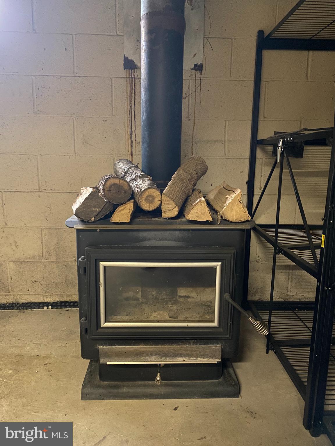 951 Hoffer Road Annville, PA 17003 - Photo 33 of 40 Wood burning fireplace in basement.
