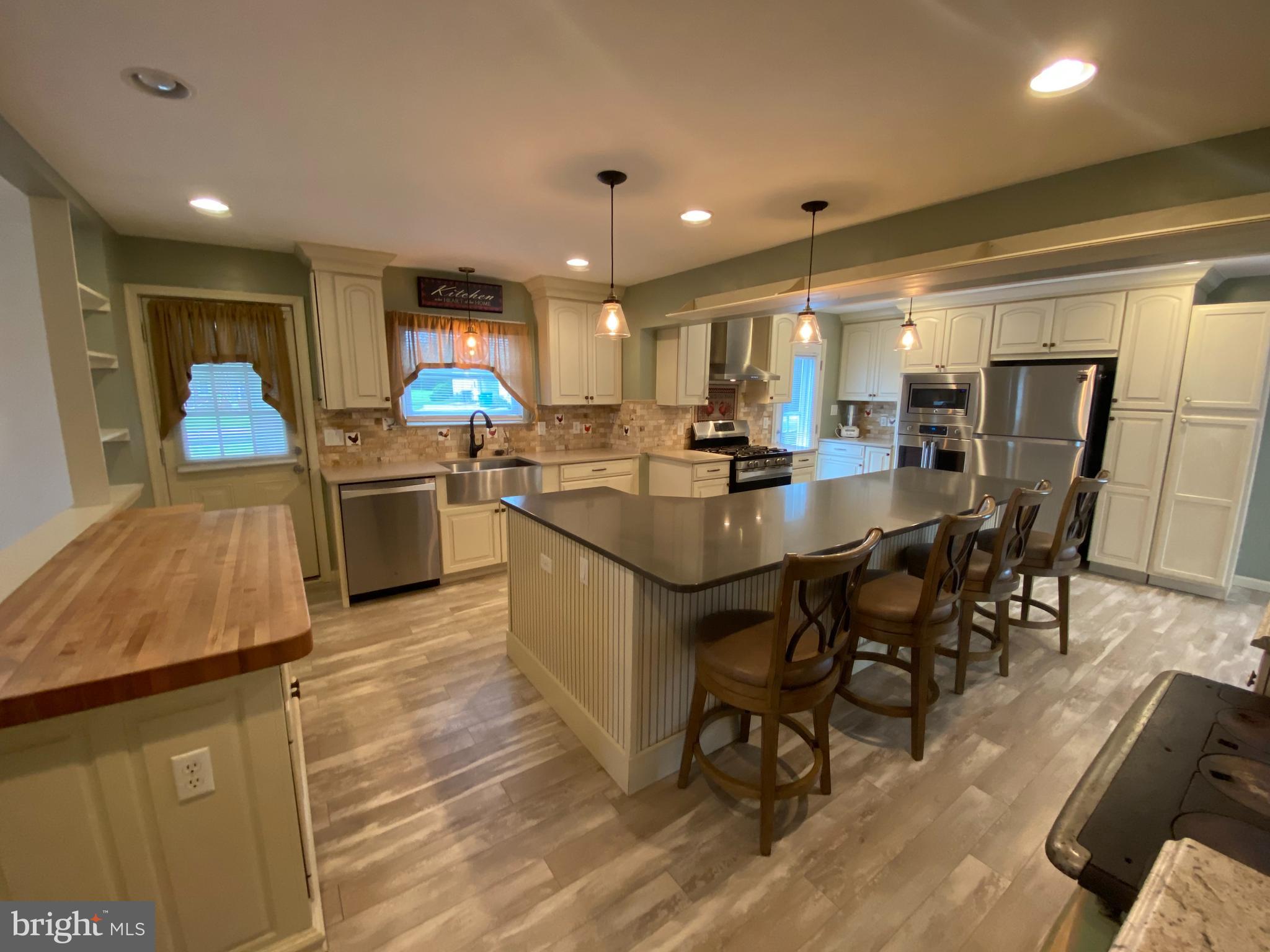 951 Hoffer Road Annville, PA 17003 - Photo 10 of 40 SS appliances, butcher block, and island seating.