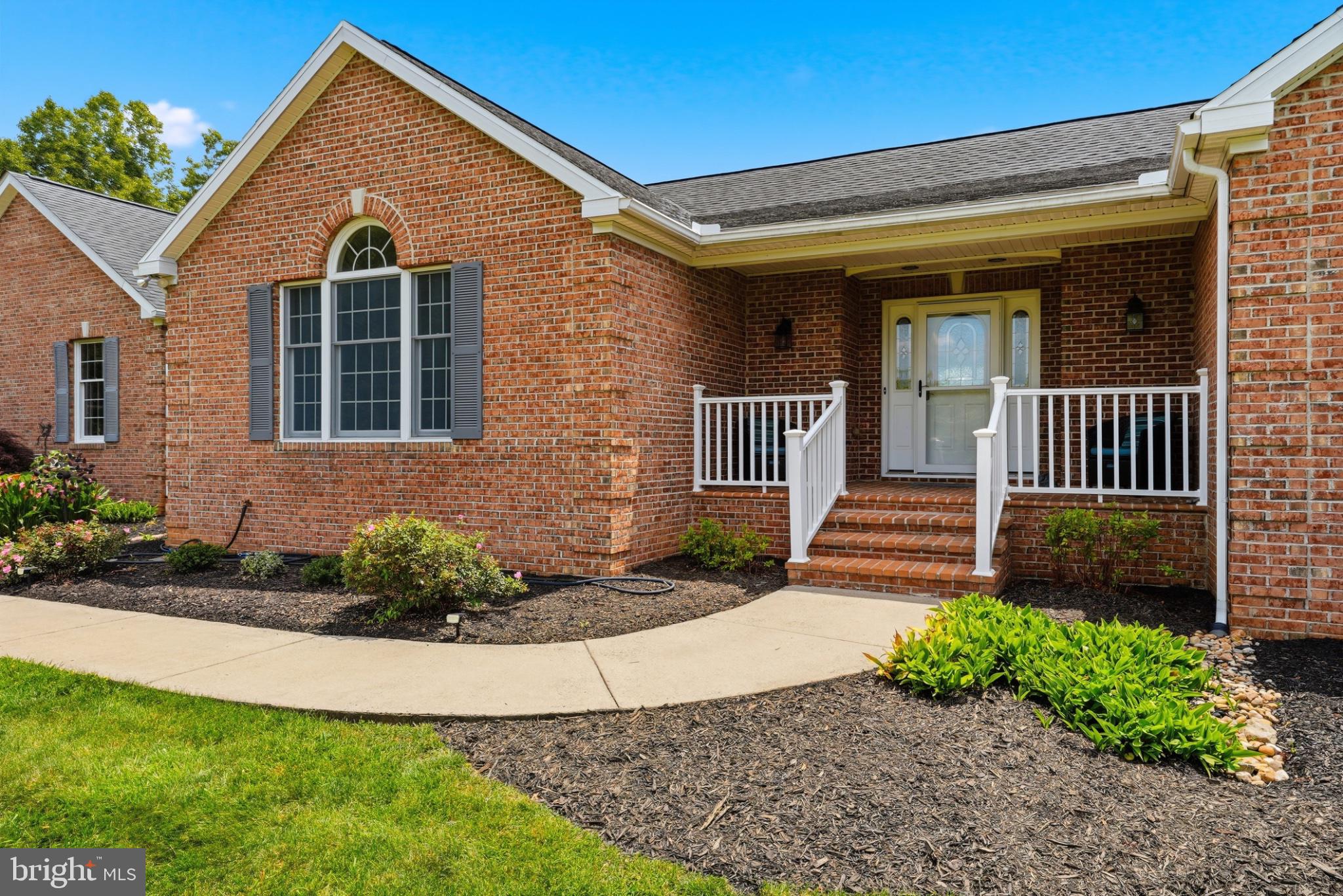 11337 Old Stillhouse Road Boston, VA 22713 - Photo 6 of 58 a front view of a house with garden