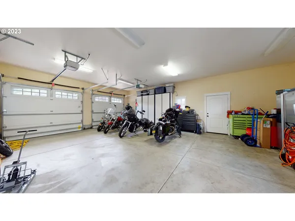 a room with furniture and white walls