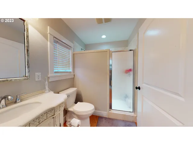 a view of a dining room with clothes and shoes