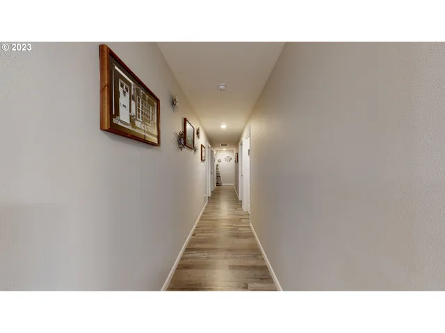 a view of multiple houses with a yard