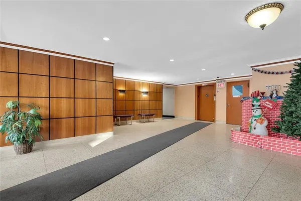 a view of a livingroom with a potted plant