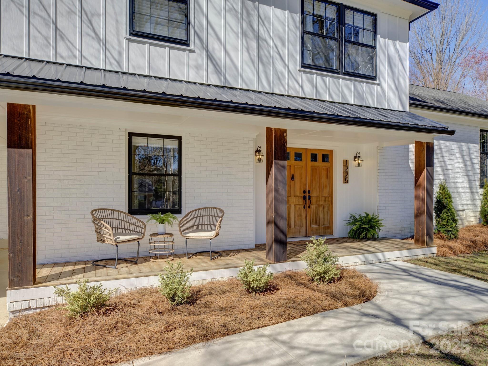 1225 Braeburn Road Charlotte, NC 28211 - Photo 2 of 45 a front view of a house
