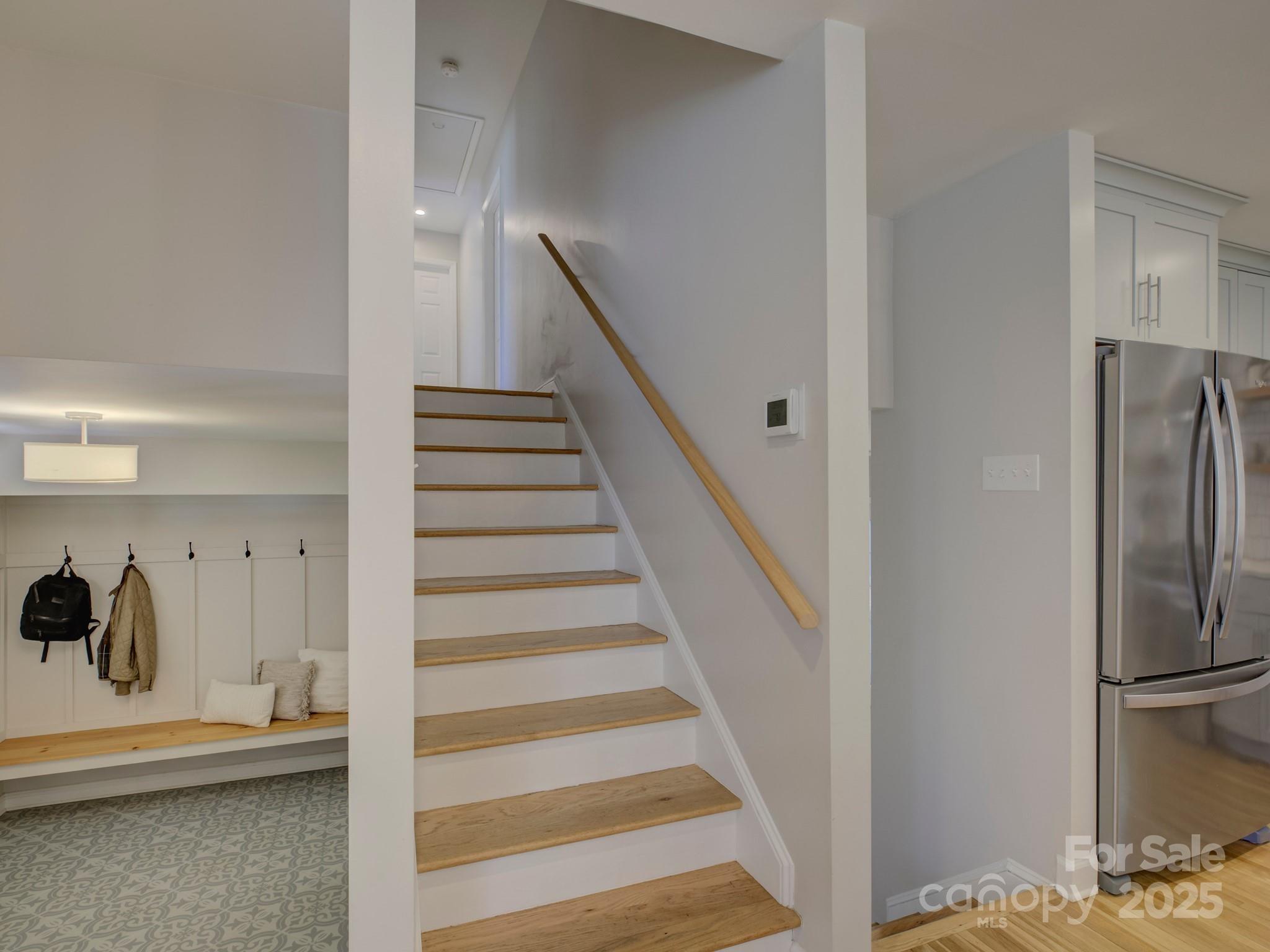 1225 Braeburn Road Charlotte, NC 28211 - Photo 23 of 45 a view of entryway and hall with wooden floor
