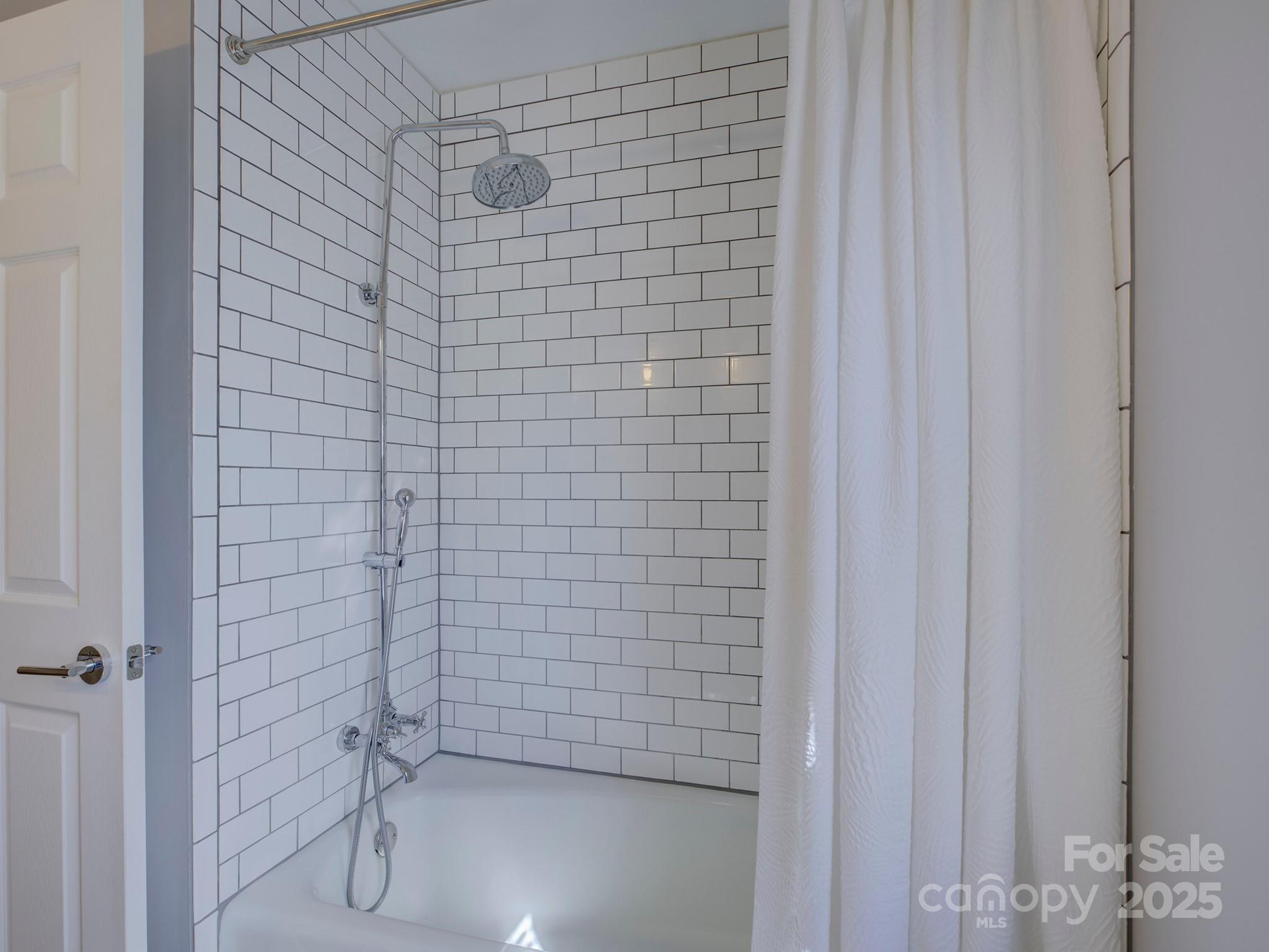 1225 Braeburn Road Charlotte, NC 28211 - Photo 27 of 45 a bathroom with a shower