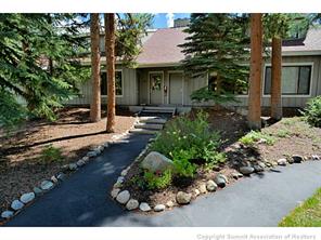 1944 Soda Ridge Road, Unit 229 Keystone, CO 80435 - Photo 2 of 25 a view of a house with a yard and garden