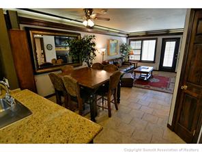 1944 Soda Ridge Road, Unit 229 Keystone, CO 80435 - Photo 11 of 25 a view of a dining room with furniture and a potted plant