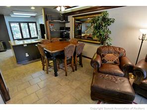 1944 Soda Ridge Road, Unit 229 Keystone, CO 80435 - Photo 12 of 25 a living room with furniture and a fireplace